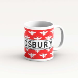 white bee on red mug